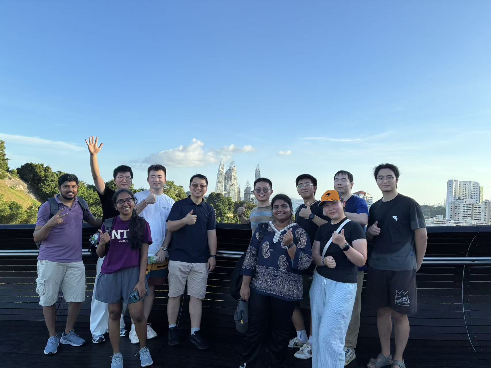 From scenic trails to karaoke nights — the team enjoyed a 10 km hike along the Southern Ridges followed by dinner and games. – image 2